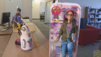 better barbie 10pkg frame 954 CU Professor Helping Shape Barbies Future Image On The Job