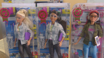 better barbie 10pkg frame 360 CU Professor Helping Shape Barbies Future Image On The Job