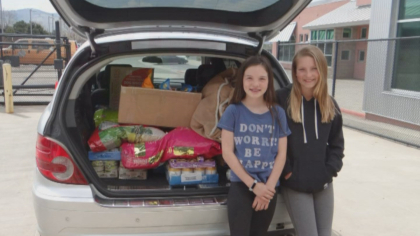 animal shelter donation 10pkg frame 1526 Girls Collect Donations To Help Feed Dogs, Cats At Animal Shelter