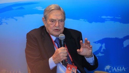 At Davos, George Soros tears into Facebook and Google
