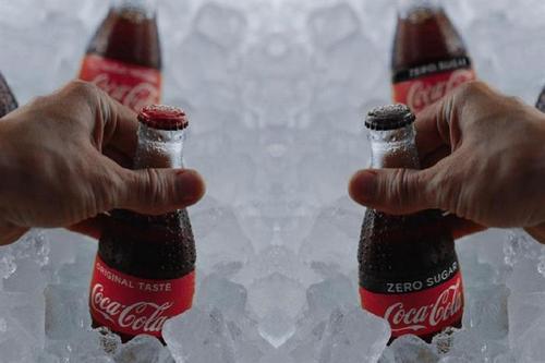 Coca-Cola reviews media planning and buying