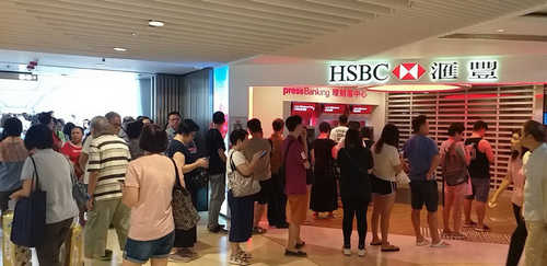 Economic Turmoil in Hong Kong Escalates as Colonial-Era Law Is Imposed