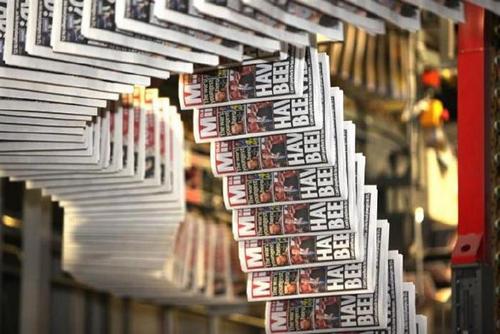 Reach newspaper group posts £113.5m loss amid falling ad revenues